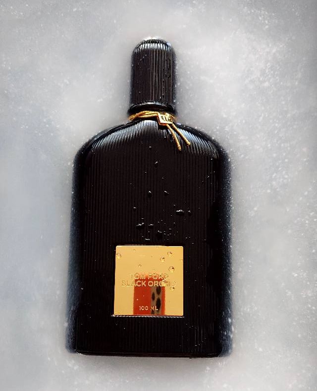 tom ford black orchid bottle in snow